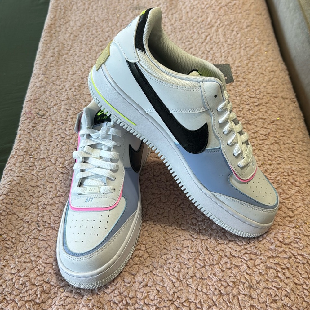 White Air Force ones with neon, pink and baby blue